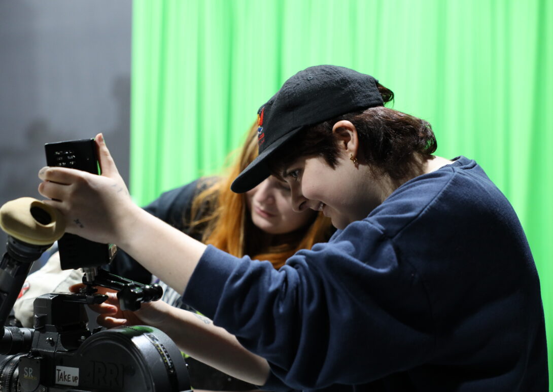 film student operating camera