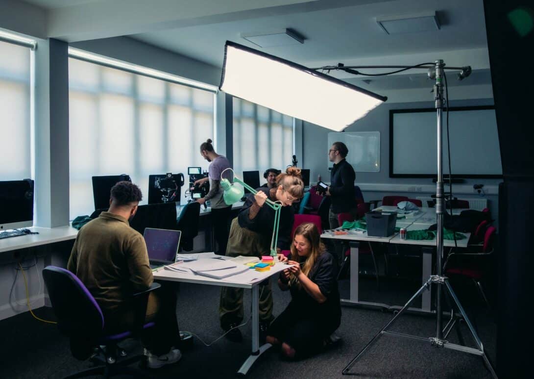 MetFilm School Brighton students arranging lighting on set