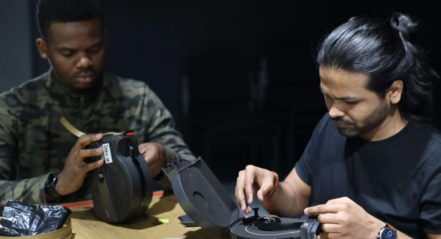 MetFilm School students disassembling film camera