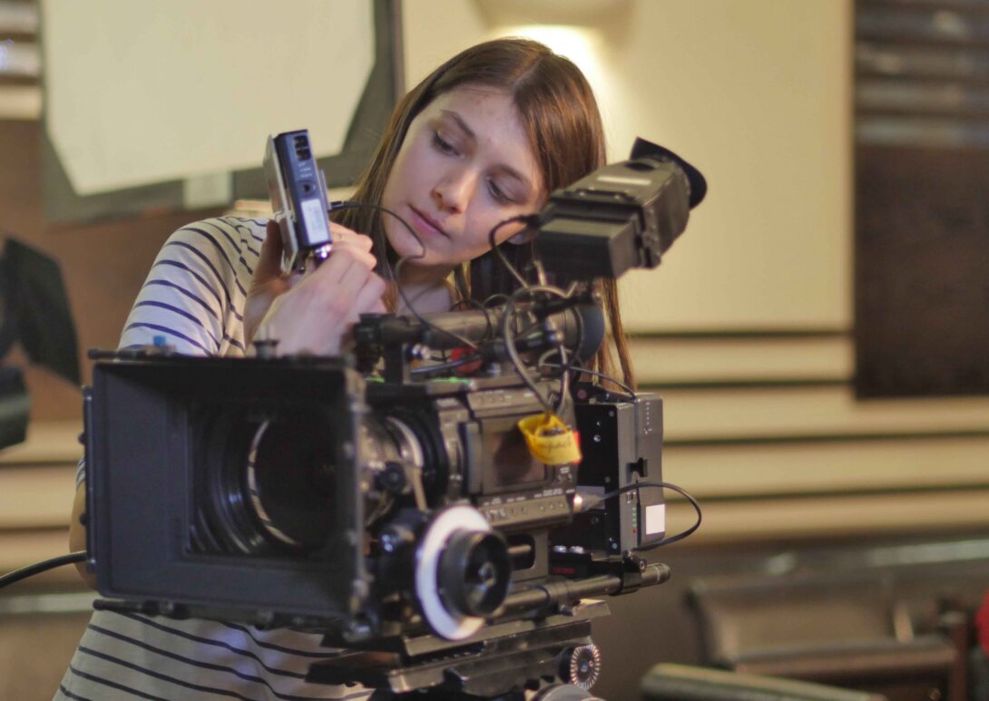 film student with camera