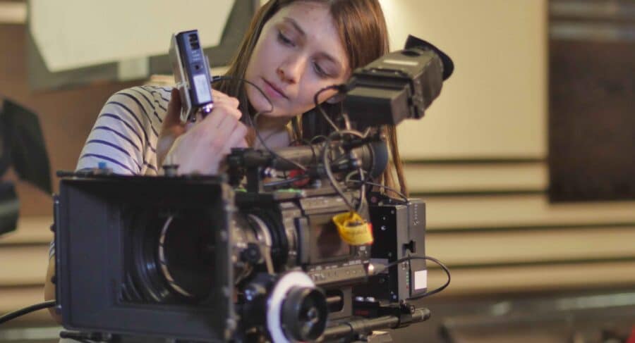 film student with camera